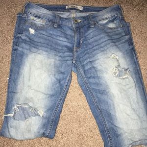 Women's lightly distressed skinny jeans.